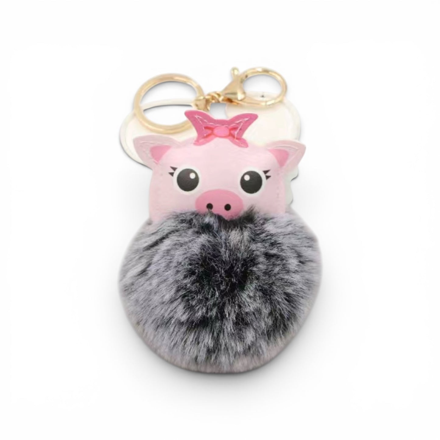 Llavero de cerdito y bolita peluda